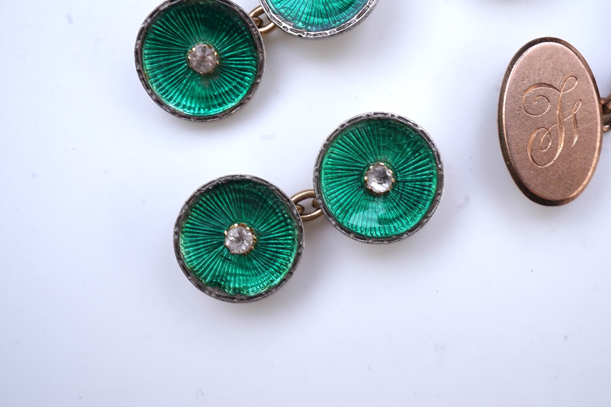 A collection of cufflinks and dress studs